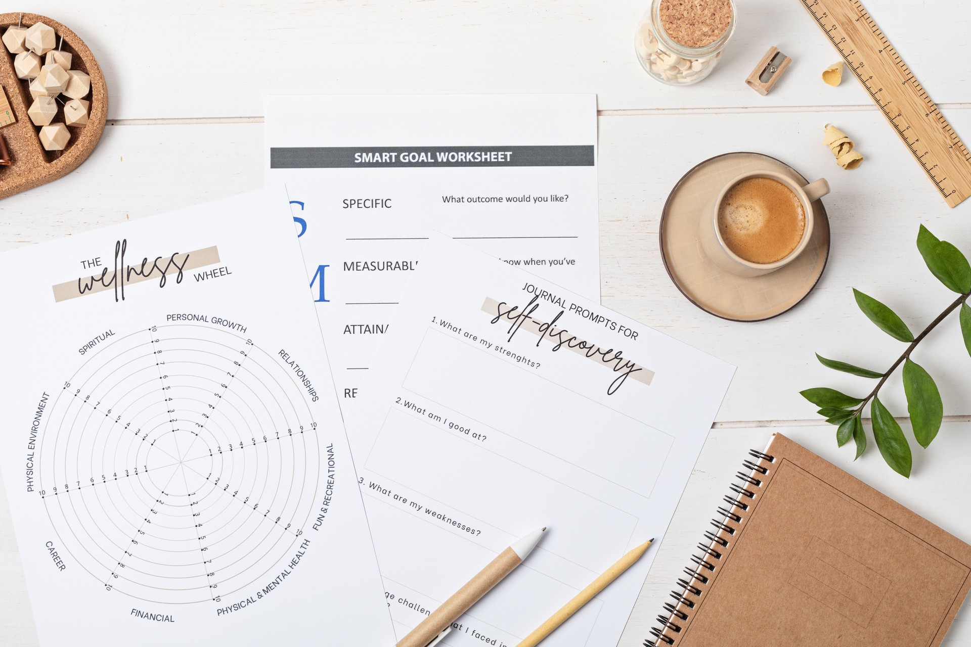 Desktop with life coaching templates and office accessories. Organization, self-development, online coaching concept. Top view, falt lay Desktop with life coaching templates and office accessories. Organization, self-development, online coaching concept. Top view, falt lay